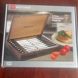 New- Wusthoff knife set.  8 knives in a wooden box/
